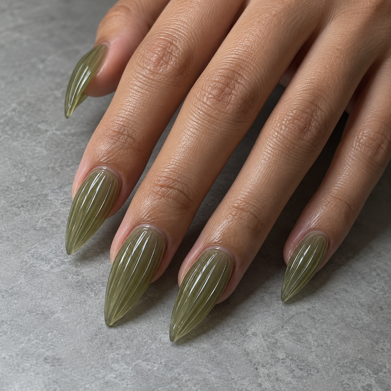 Muted olive with a ribbed-glass finish nail inspiration